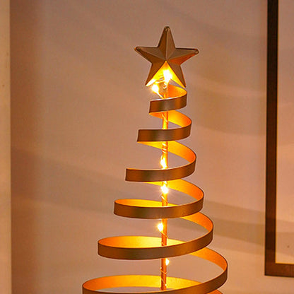 Goldener Stern an der Spitze der Spiralbaum-Lampe mit sanft leuchtender LED